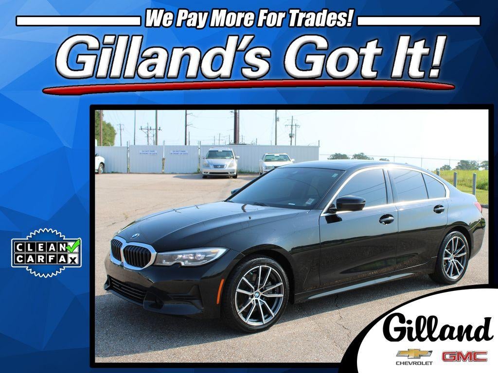 2021 BMW 3 Series 330i xDrive in Black — front three-quarter view