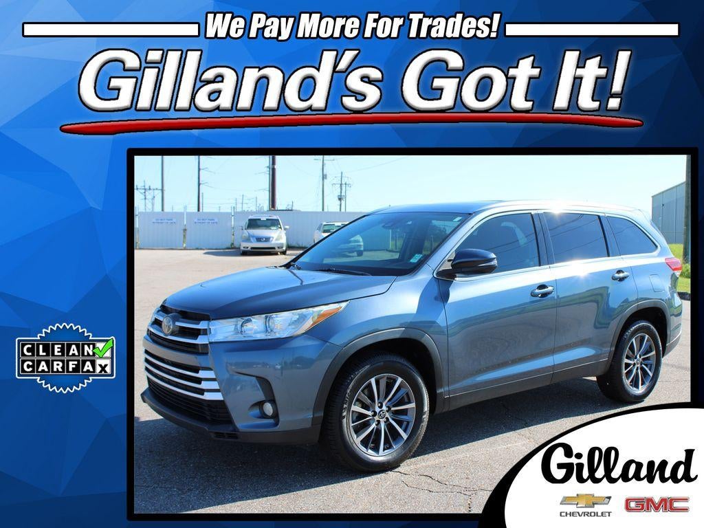 2019 Toyota Highlander SE in Blue — front three-quarter view